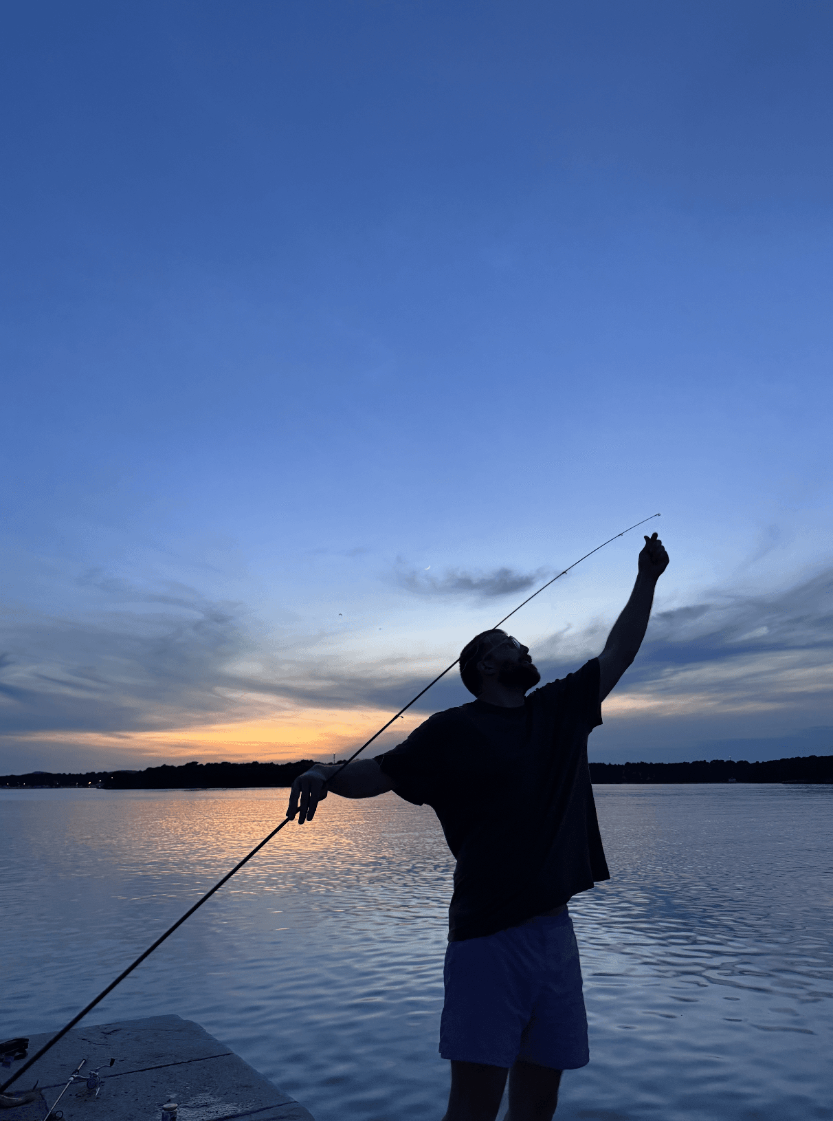 Nedim fishing at sunset