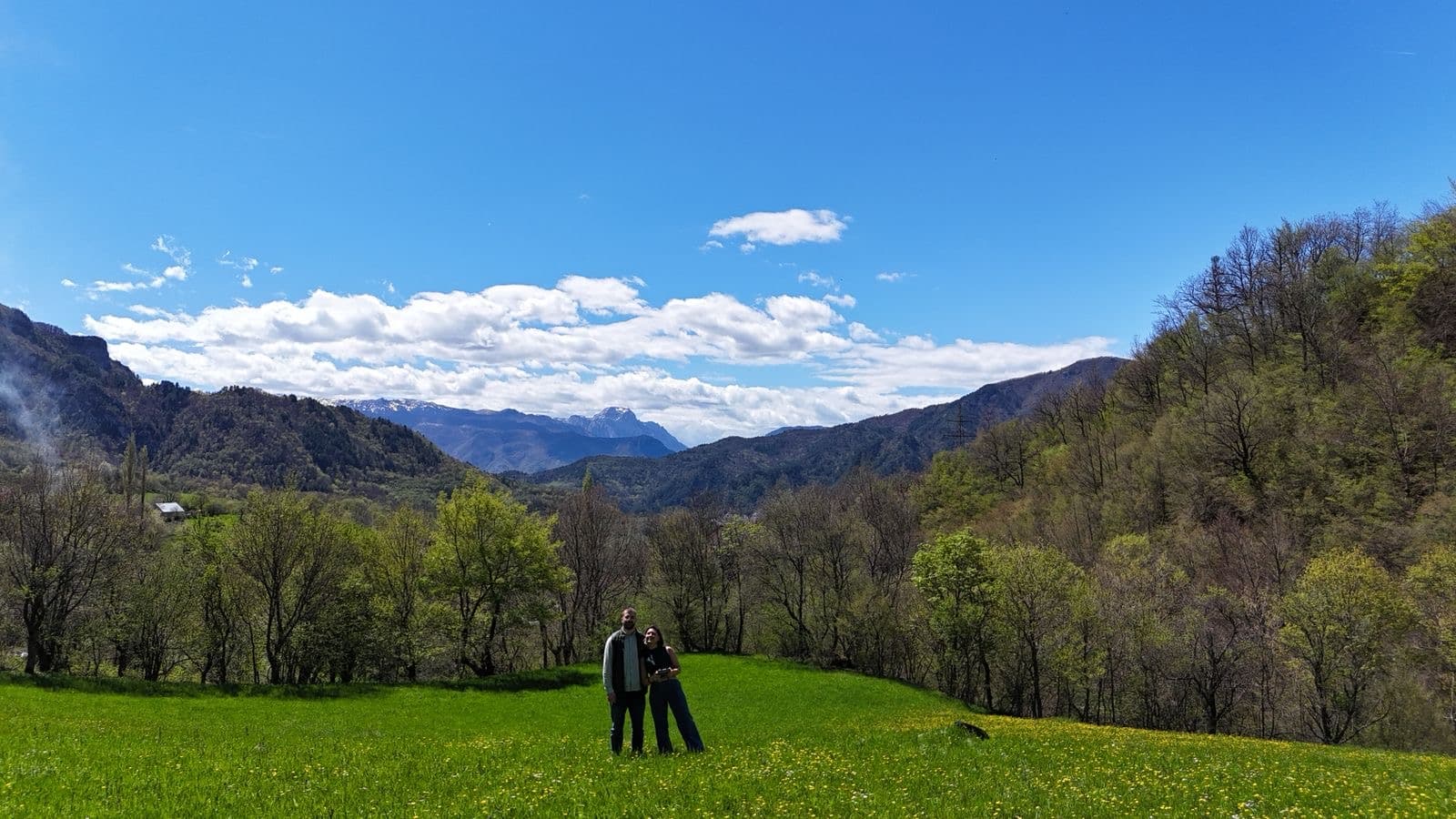 Nedim in beautiful mountain landscape with partner